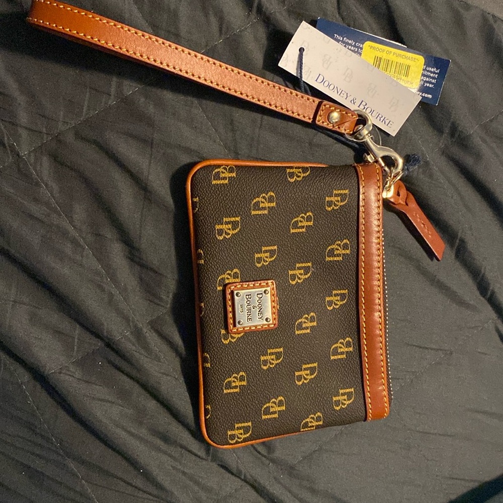 Dooney and Bourke wallet/wristlet 
Brand new with tags